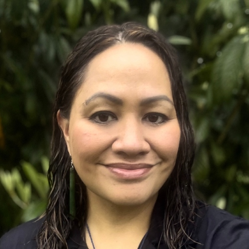A young women smiling in a selfie.