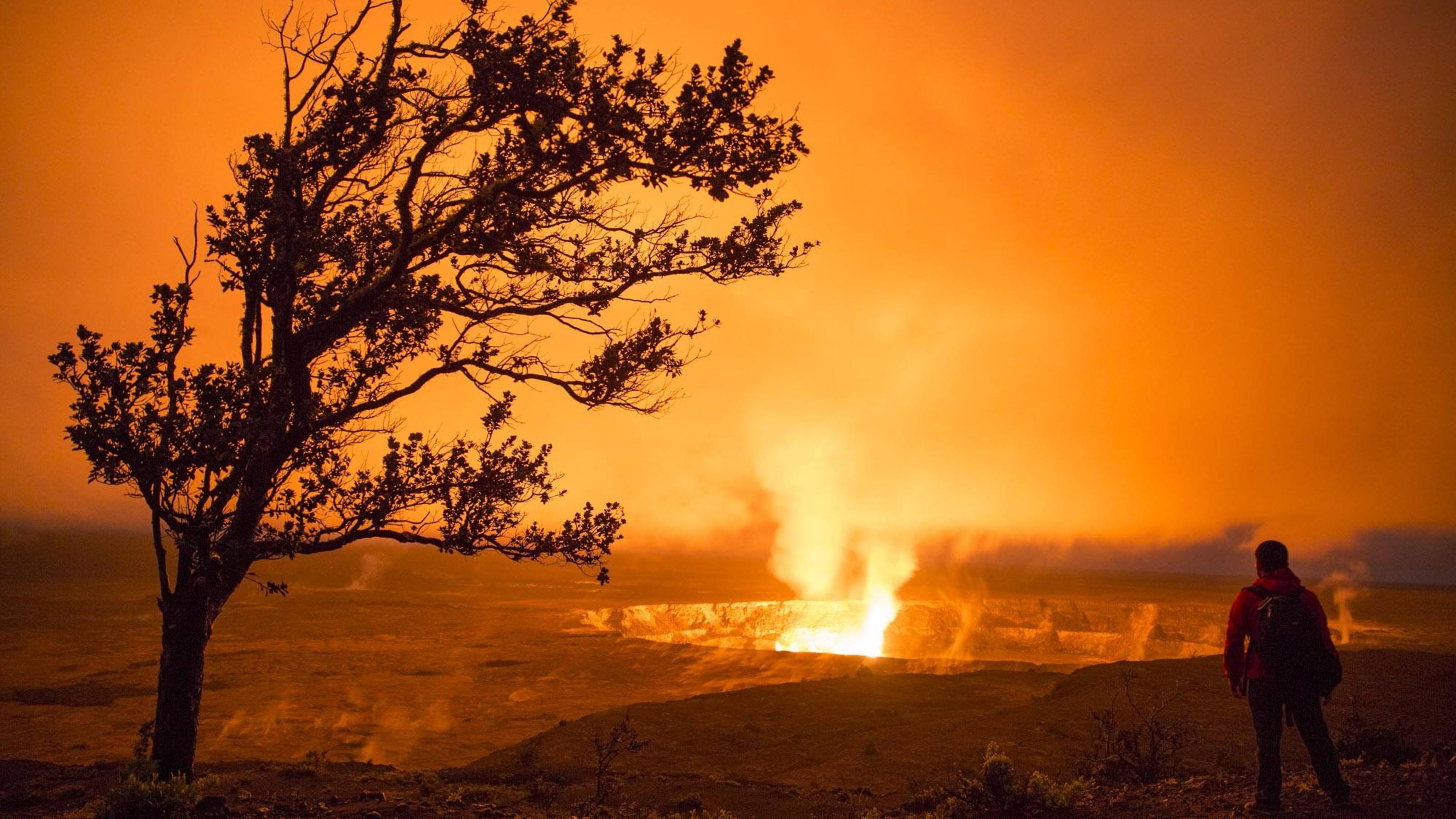 Person standing near a Volcano