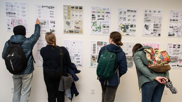 People looking at student posters