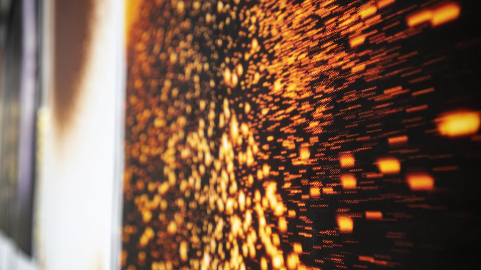 Experience black print speckled with orange