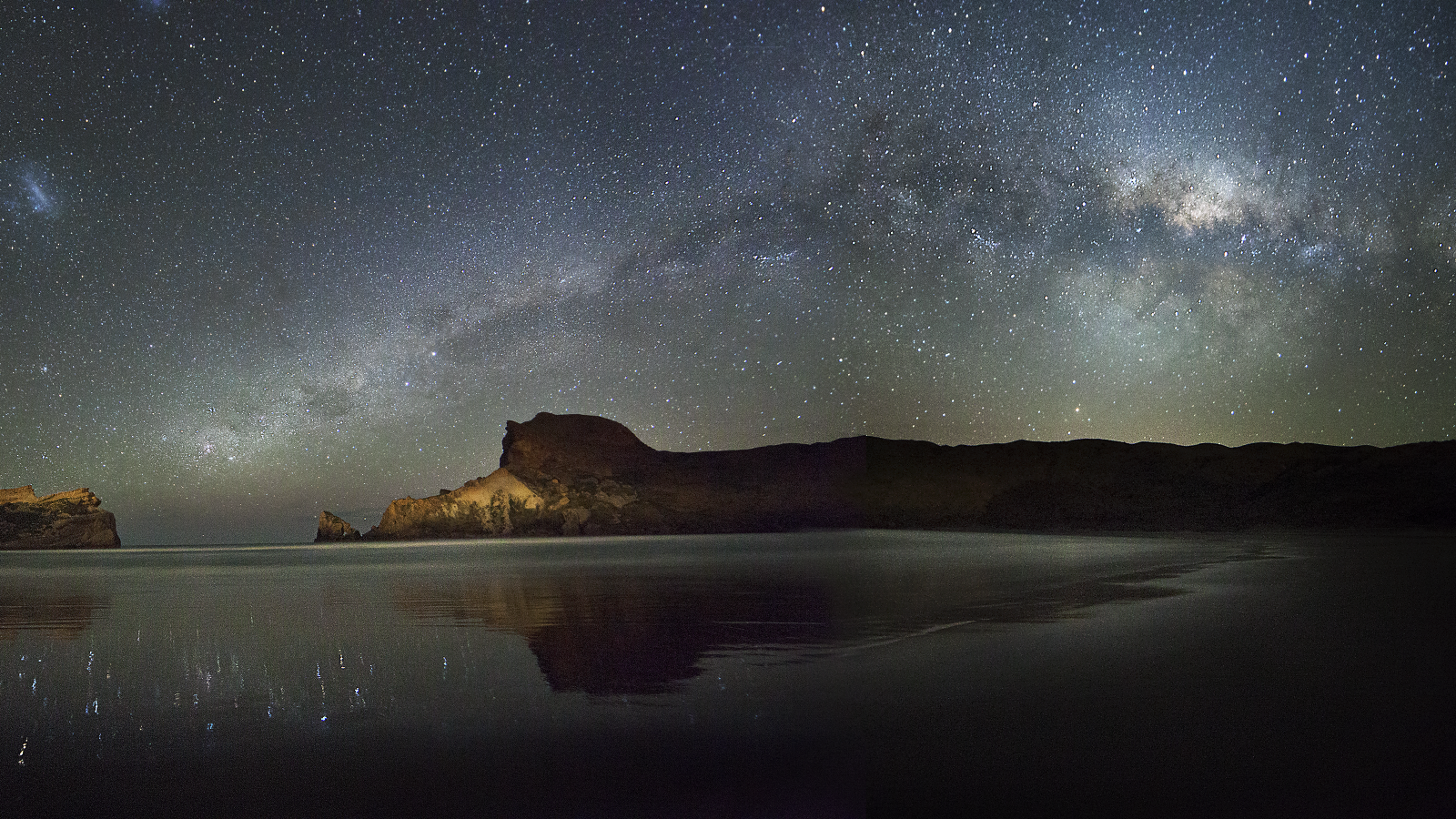 Imagery of the night sky looking up from a beach