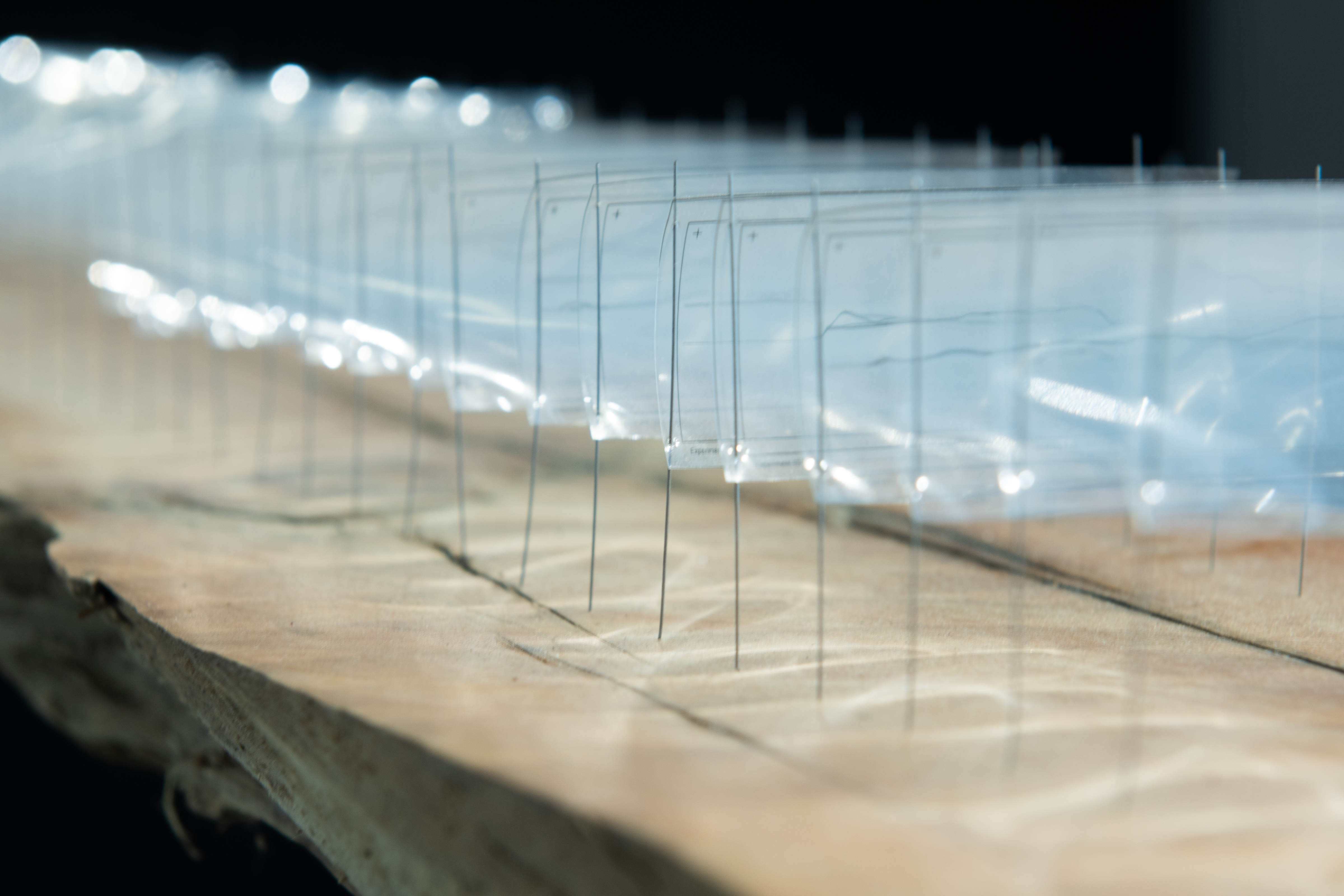 image of clear plastic sheets stuck into a timber frame